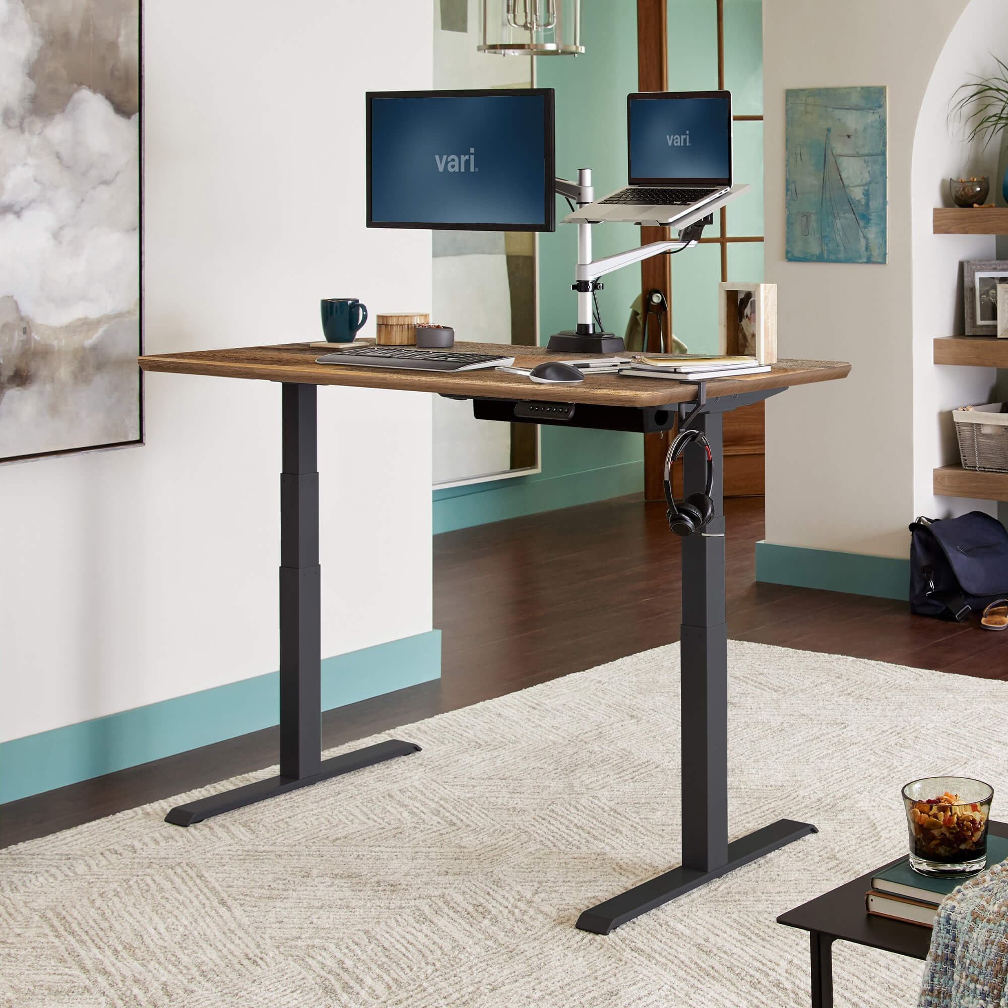Vari Electric Standing Desk 60x30 in reclaimed wood finish in a home office setting